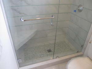 Glass enclosed shower by New View